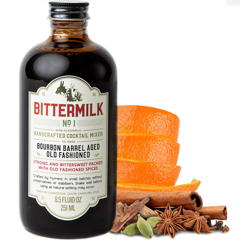 Bittermilk No.1 old fashioned mixer bottle on bar cart for crafting nuanced cocktails at home