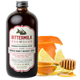 Bittermilk No.3 bottle close-up shows smoked honey and natural ingredients for cocktails.