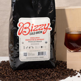 Bizzy Organic Cold Brew beans close-up showing rich, even roast for balanced flavor