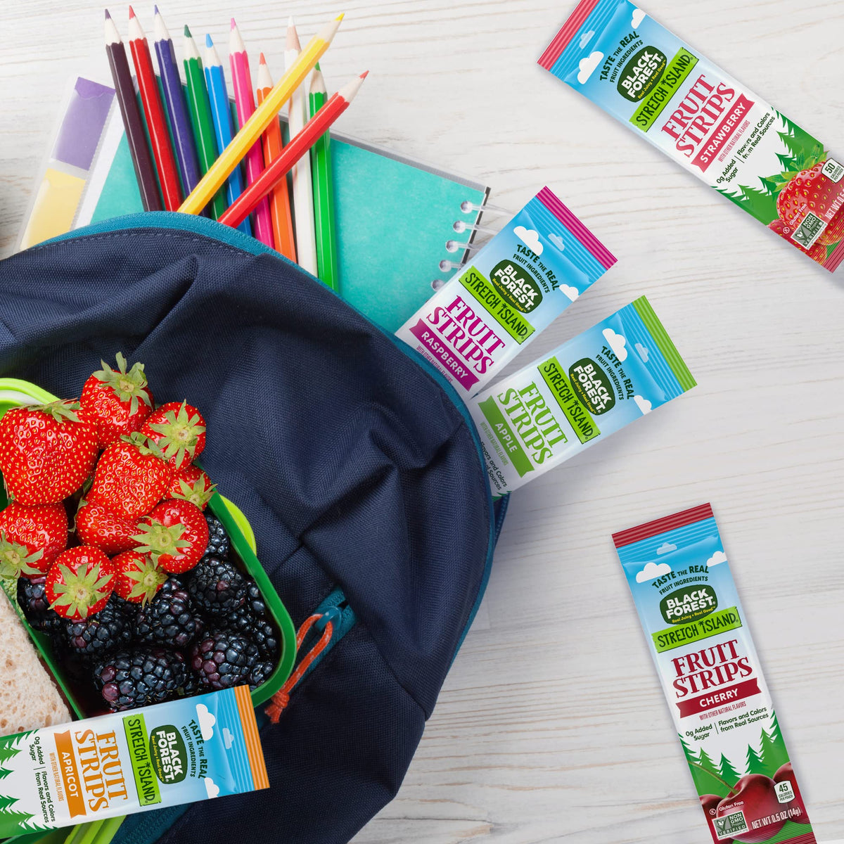 Black Forest Stretch Island Raspberry Strip close-up highlights real fruit puree and berry flavor.