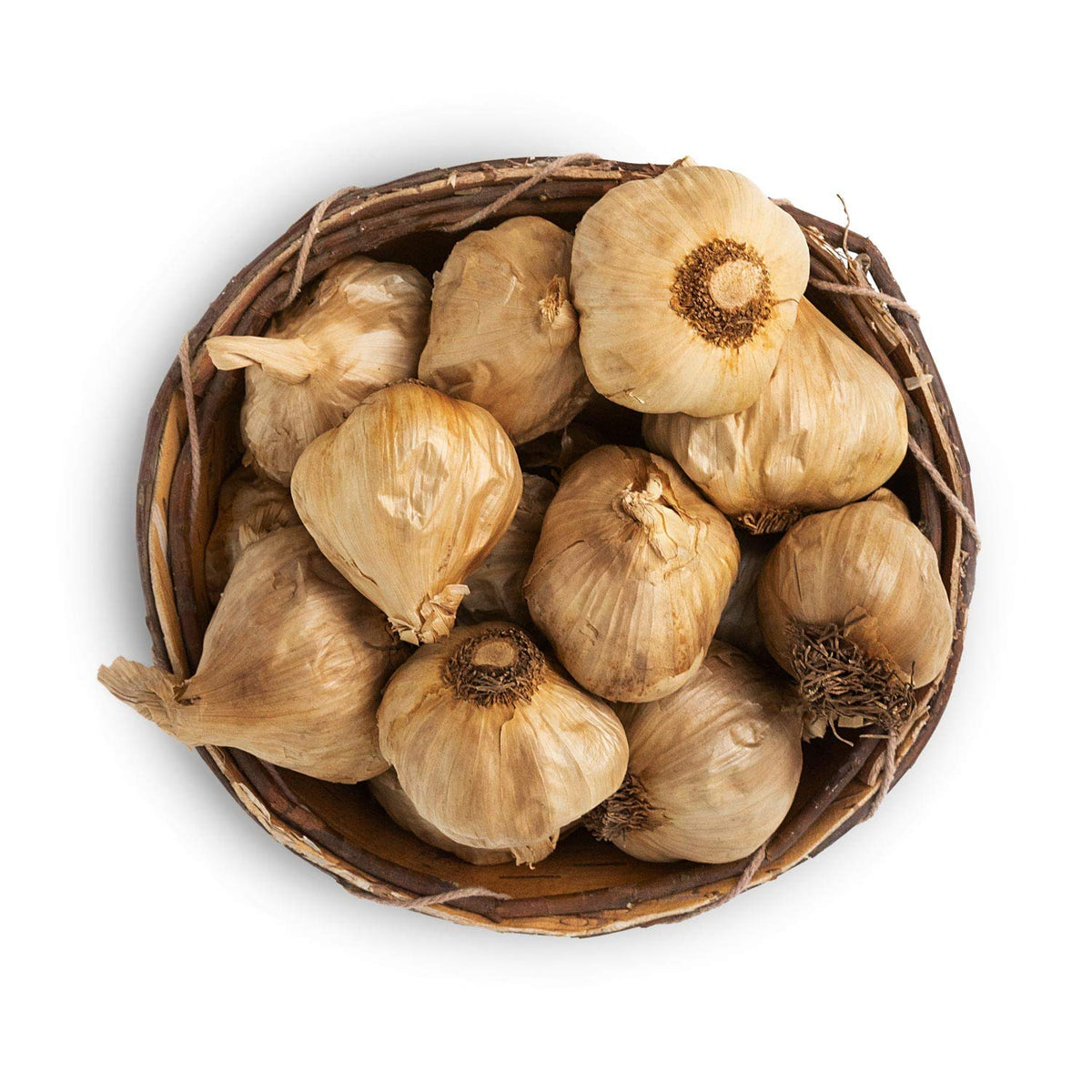 Black Garlic North America cloves being added to a simmering sauce.