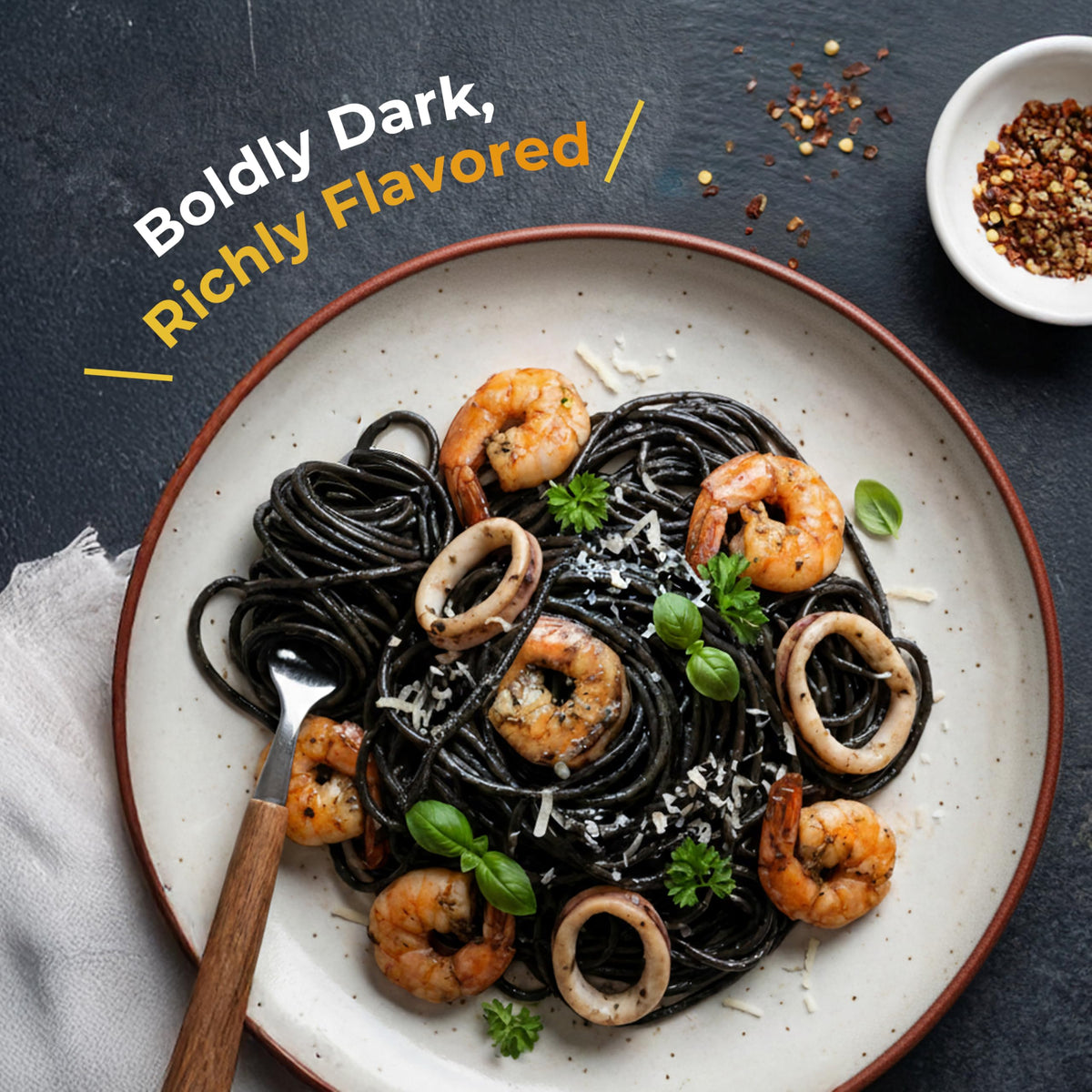Black Hut squid ink paella pan adds dramatic color to seaside meals