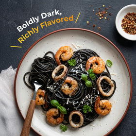 Black Hut squid ink paella pan adds dramatic color to seaside meals