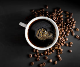 Black Insomnia Vanilla Bourbon coffee beans exhibit potent roast and vanilla notes.