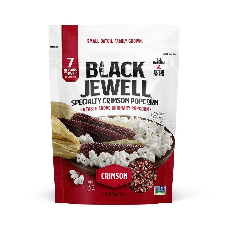 Black Jewell Crimson Heritage kernels in a bag, ready to pop for a crisp, flavorful snack.