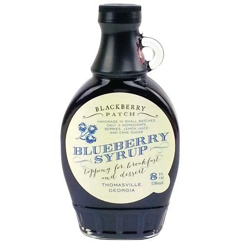 Blackberry Patch Blueberry Syrup bottle pour, a versatile topping for pancakes, waffles, and desserts.