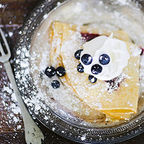 Close-up of Blackberry Patch N's Wild Blueberry Syrup label showing no sugar added