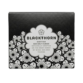 Close-up of Blackthorn salt flakes highlighting texture for finishing meals.