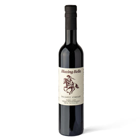 Blazing Bella barrel aged balsamic Modena bottle ready for drizzle on meals