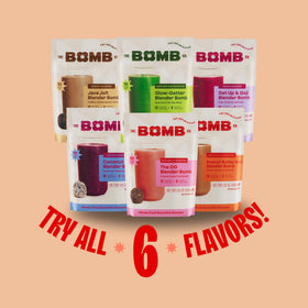 Blender Bombs Peanut Butter Blast on kitchen counter with fruits, nutritious routine.
