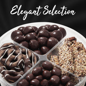 Bloom's celebration scene with Bloom's chocolate gift box on a festive table