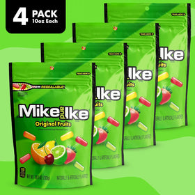 Mike and Ike cinema boxes beside popcorn for home movie night.