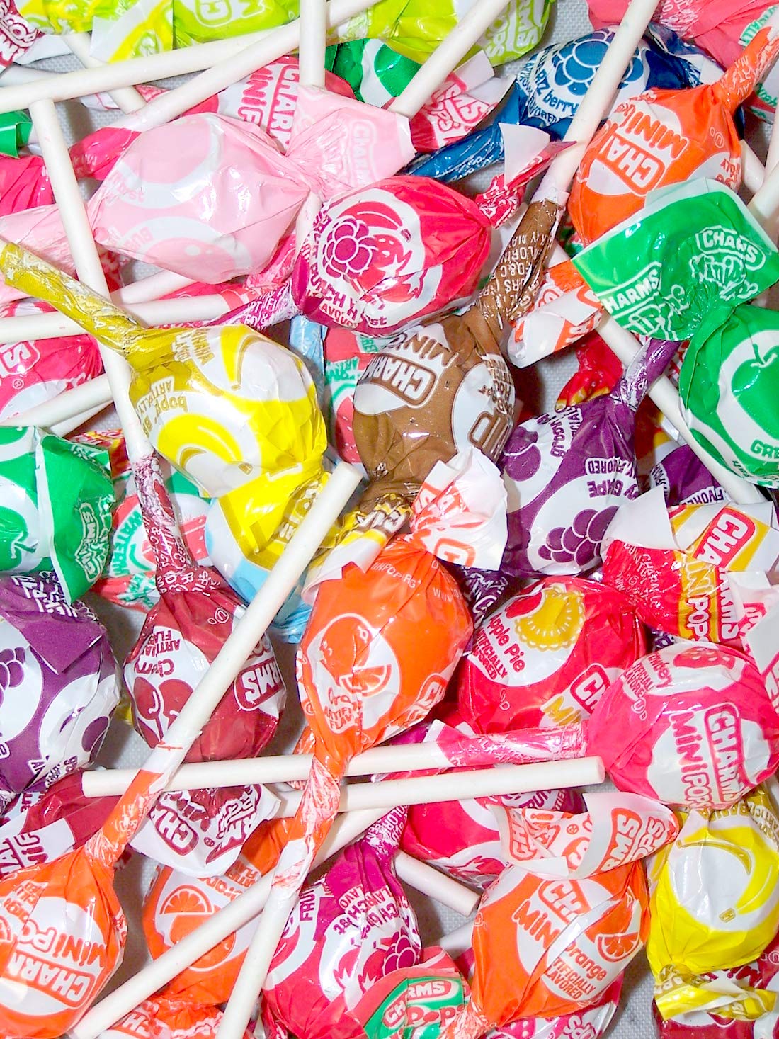 BLOW POP Charms Minipop Blue Razz flavor pop, crisp candy bite for kids and families.