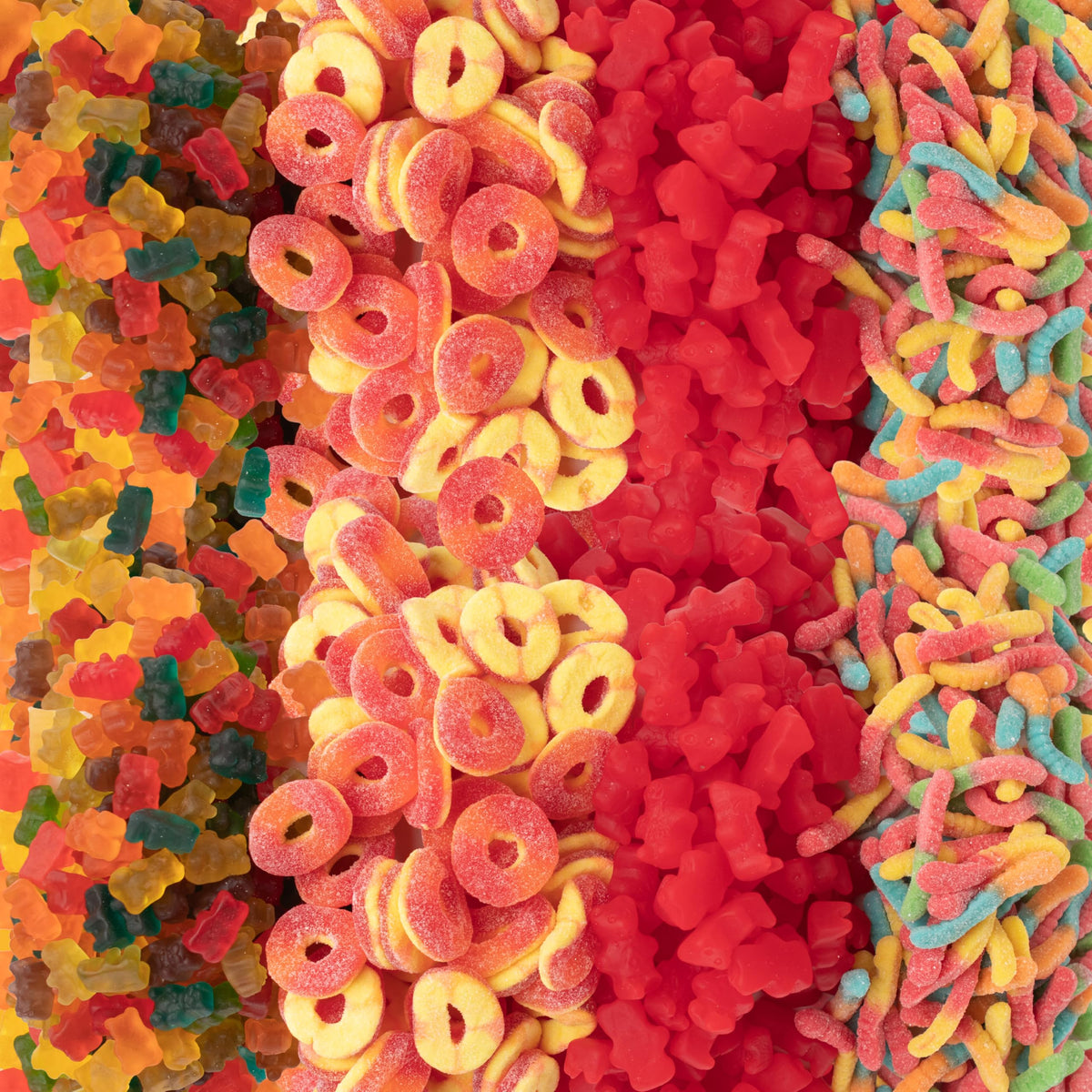Blue Bow Gourmet sour gummy worms adding tang to a candy display