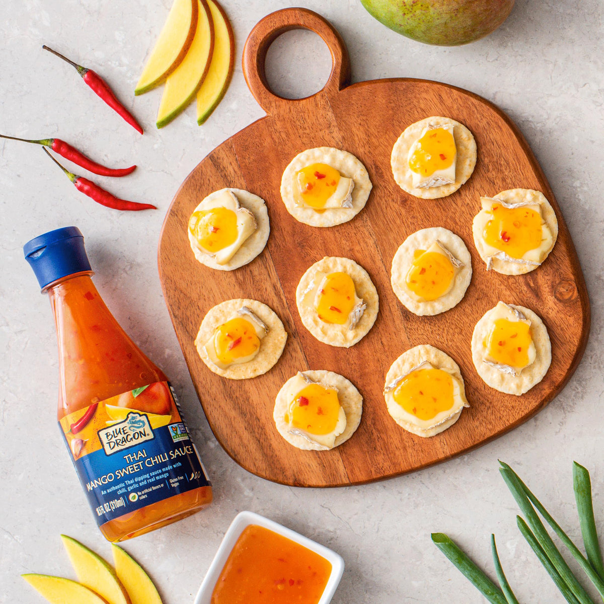 Blue Dragon ingredients closeup showcases mango, chili, garlic flavor.