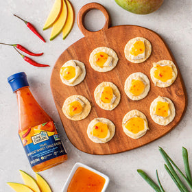 Blue Dragon ingredients closeup showcases mango, chili, garlic flavor.