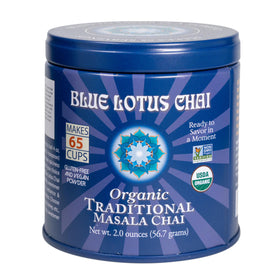 Blue Lotus Chai powder in a tin close-up highlighting organic spices for quick, authentic tea
