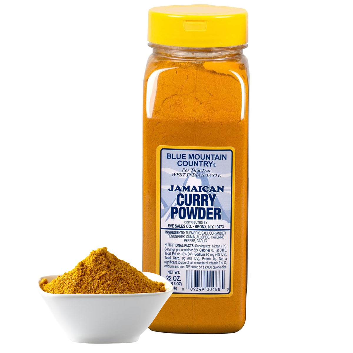 Blue Mountain Country curry powder sizzling in a pan, adding aroma and depth