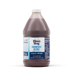 Blues Hog Champions' Blend bottle closeup showing bold, versatile BBQ flavor