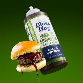 Blues Hog Smokey Mountain Sauce on a dining table ready for family cookouts.
