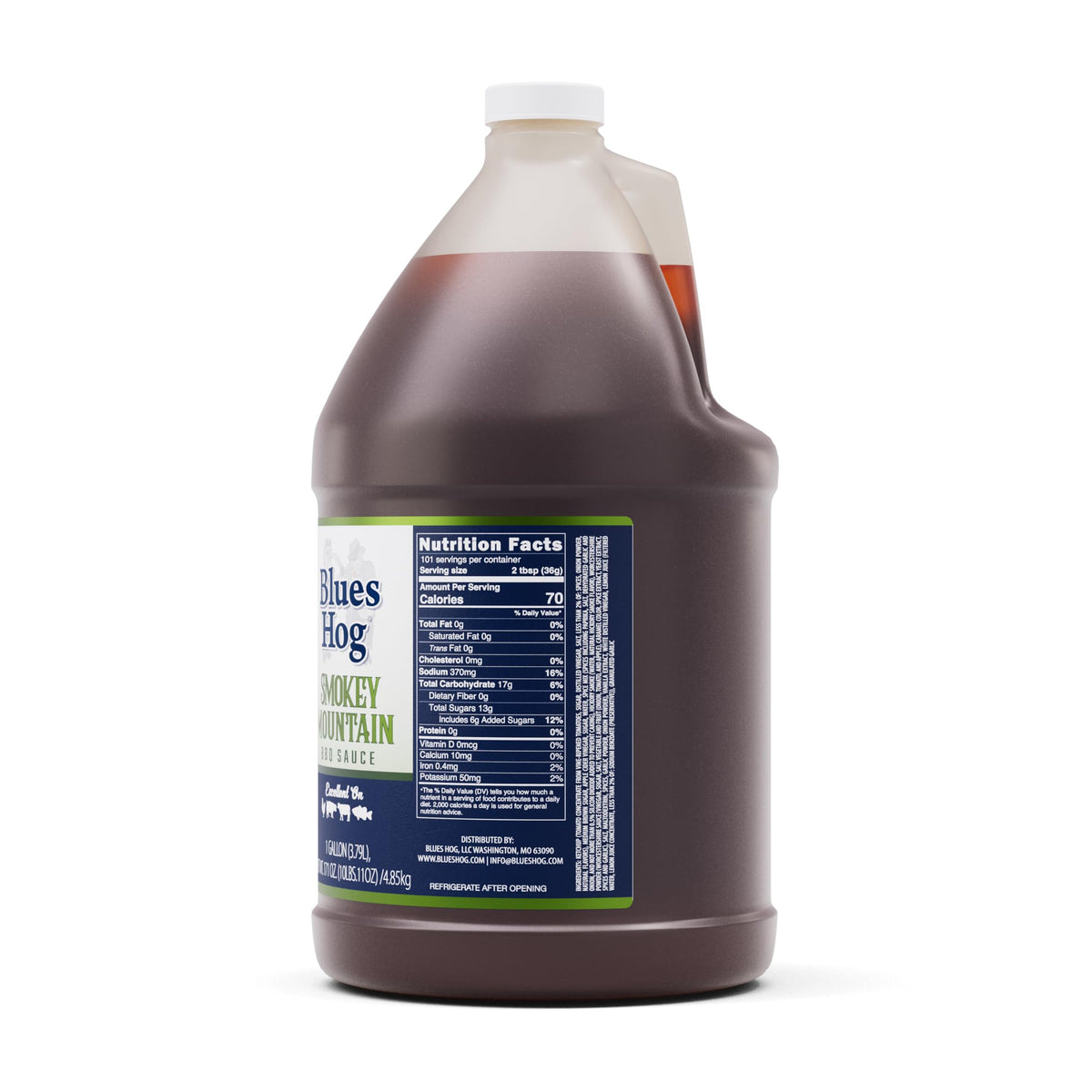 Blues Hog Smokey Mountain Sauce pouring to glaze meats with rich flavor.