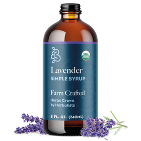 Bluestem Botanicals Lavender Simple Syrup bottle enhances cocktails and mocktails with floral sweetness.