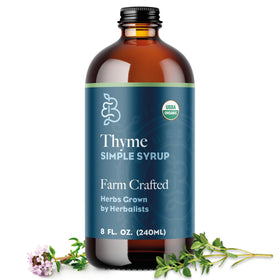 Bluestem Botanicals Organic Thyme Simple Syrup bottle, herbal flavor enhancer for drinks.