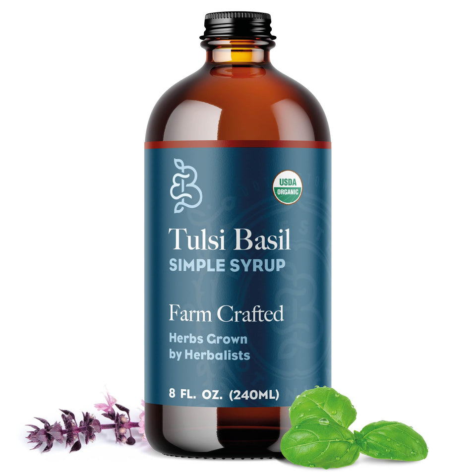Bluestem Botanicals Tulsi Basil Simple Syrup bottle enhances cocktails with floral-spicy depth.