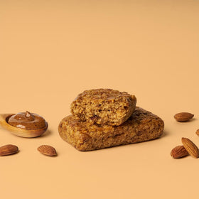 Bobo's Almond Butter Oat Bars packaging with gluten-free label and non-GMO claim.