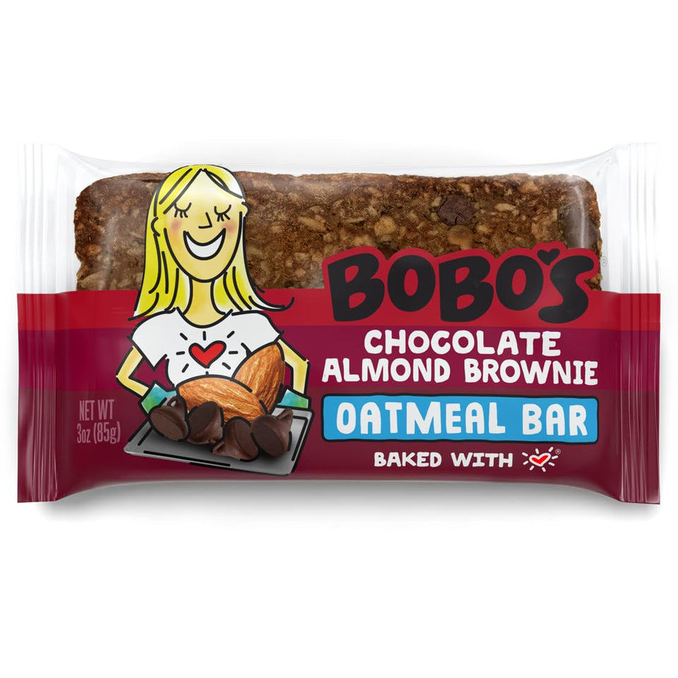 Bobo's Chocolate Almond Brownie Oat Bar on a wood counter for a convenient breakfast on the go.
