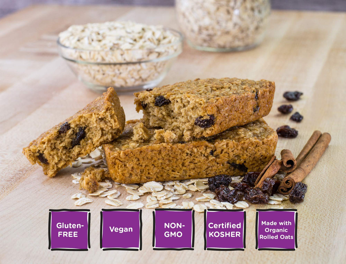 Bobos Cinnamon Raisin Oat Bars with a glass of milk, plant-based, ready-to-enjoy snack