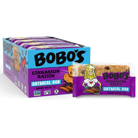 Unwrapped Bobos Cinnamon Raisin Oat Bar showing chewy texture and cinnamon raisin center