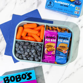 Bobo's Fig Bars pictured at a desk, a convenient office snack.