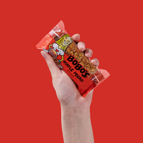 Bobo's Maple Pecan Oat Bar on the go, perfect breakfast or snack.