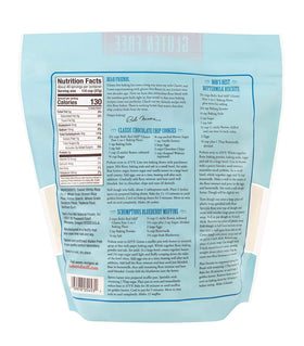 Bob's Red Mill 1-To-1 flour with measuring cup, perfect for precise gluten-free substitutions.