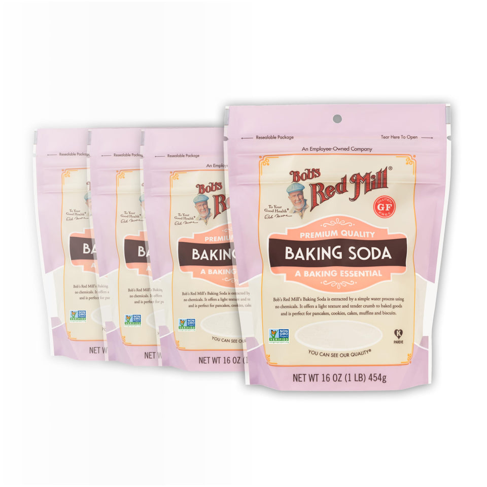 Bob's Red Mill baking soda 16oz pack of four bottles on shelf for versatile baking.