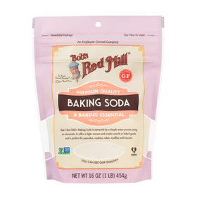Bob's Red Mill baking soda on kitchen counter, ideal for quick breads, cookies, and muffins.