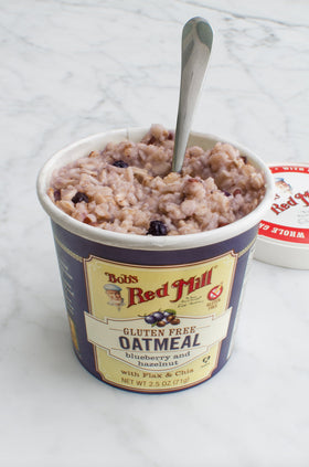 Bob's Red Mill Oatmeal Cup shows blueberries and hazelnuts for a tasty boost.