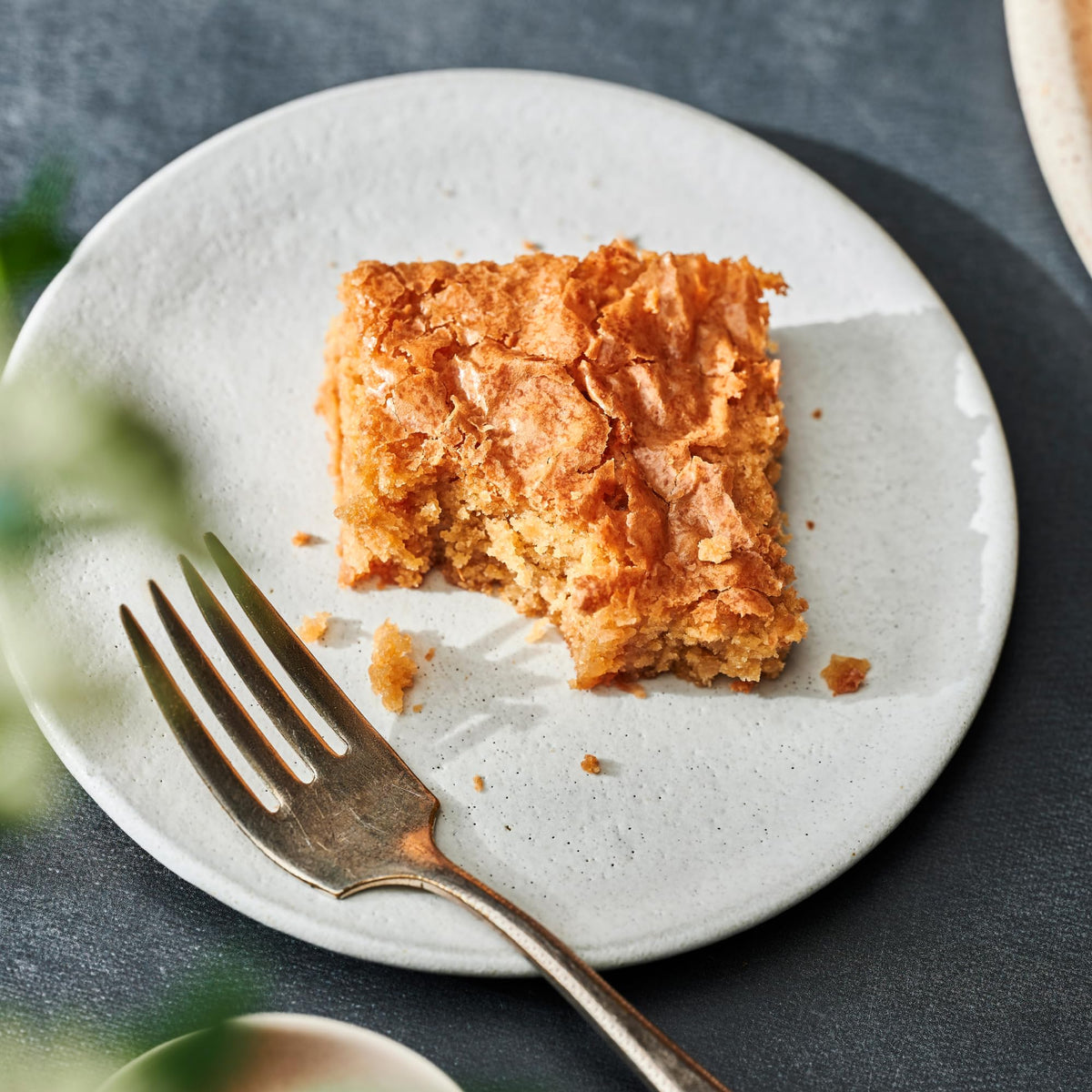 Warm blondies served with ice cream for a comforting treat.