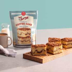 Bob's Red Mill Cinnamon Swirl Coffee Cake Mix cinnamon topping packet close-up for flavorful swirls.