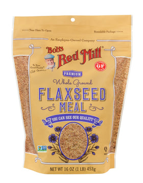 Bob's Red Mill flaxseed meal being poured for easy topping.