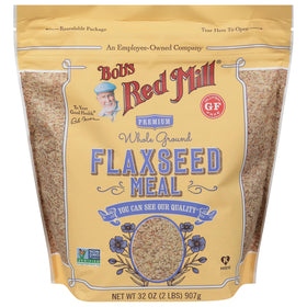 Bob's Red Mill flaxseed meal scoop beside measuring spoon, indicating easy protein boost.