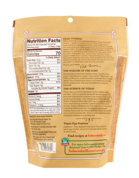 Bob's Red Mill Golden Flaxseed Meal canister with scoop, highlighting fiber and protein.