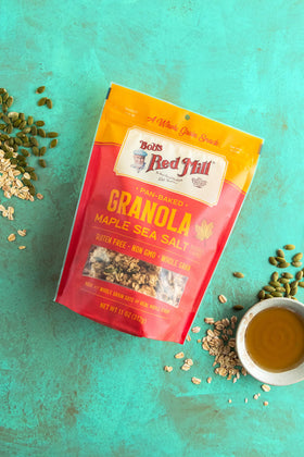 A single-serve scoop of Bob's Red Mill Maple Sea Salt Granola over milk for breakfast.