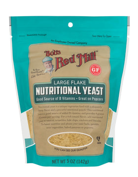 Bob's Red Mill nutritional yeast pourable flakes image, dairy-free cheesy note