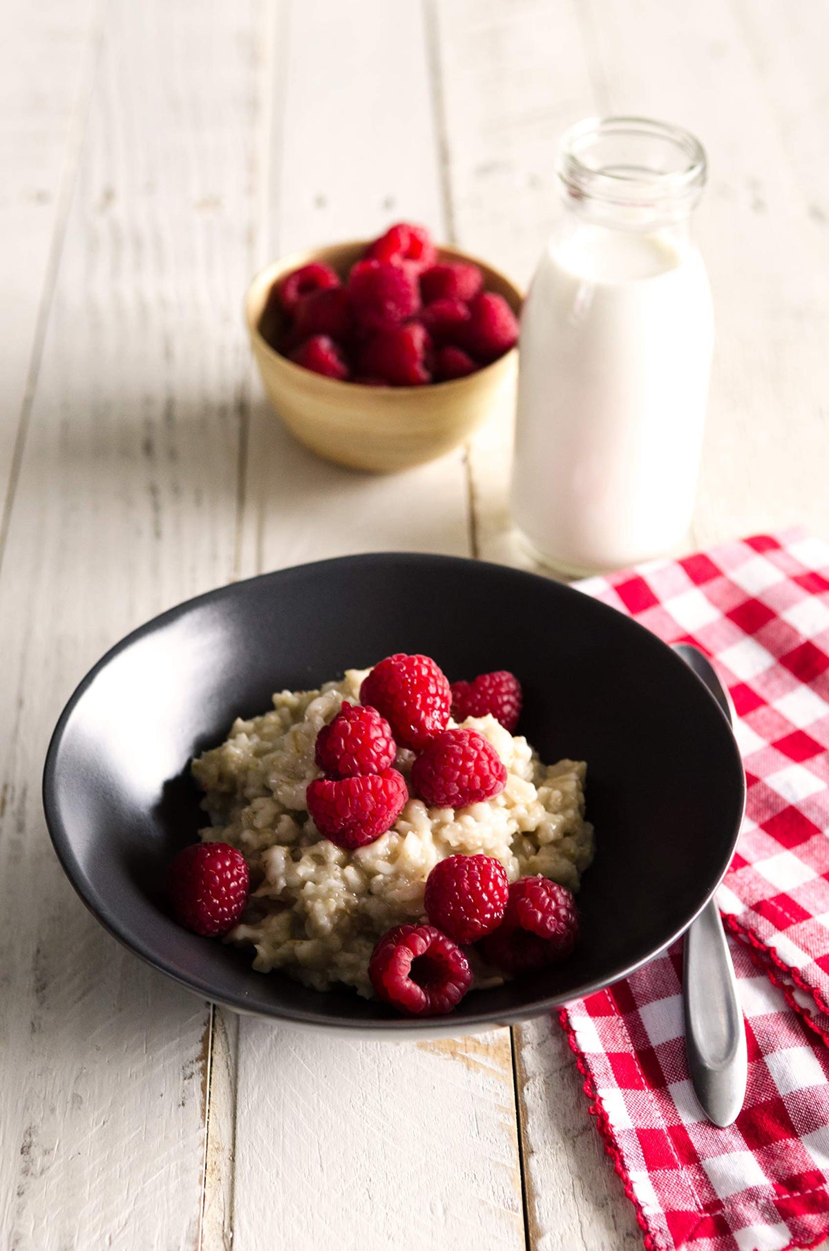 Bob's Red Mill oats measured in a cup versatile base for recipes