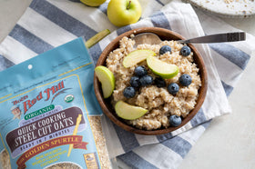 Bob's Red Mill oats measured in a cup for portion control.