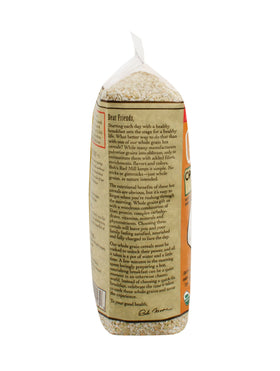 Stone-ground milling detail emphasizing texture and creamy buckwheat cereal.