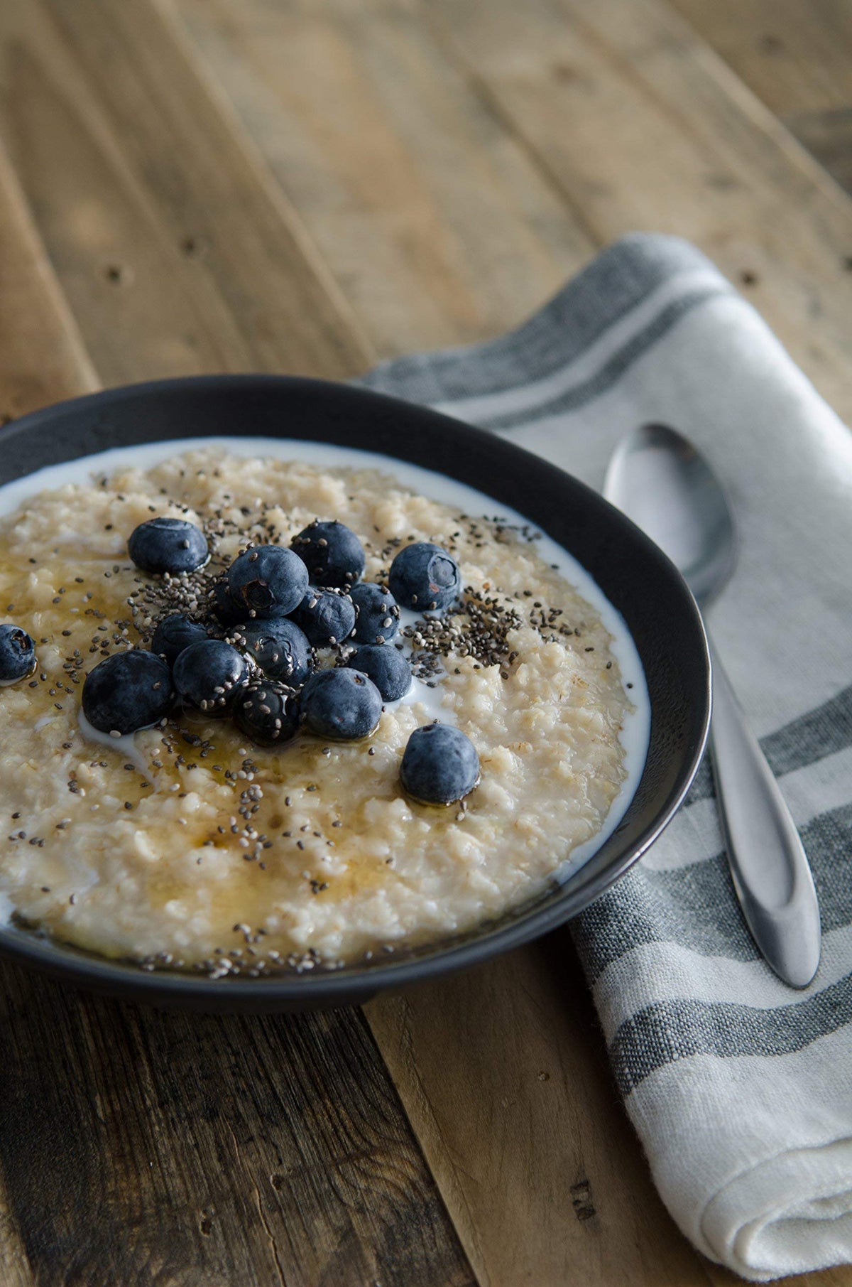 Oats poured into a saucepan, creating a creamy porridge texture.