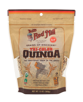 Uncooked Bob's Red Mill Organic Tri-Color Quinoa grains show vibrant mix